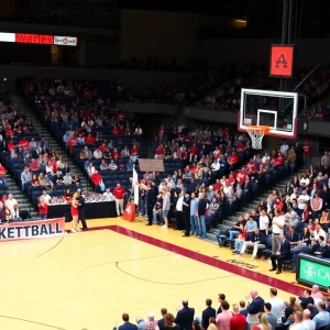 Crowd at a college basketball game with fans cheering