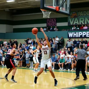 Paden Pirates and Varnum Whippets basketball players in action at Paden High School Gymnasium