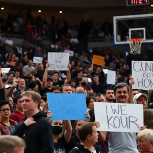 A crowded basketball arena during a tense game with fans expressing various emotions.